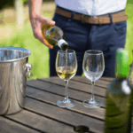 mid-section-of-man-pouring-wine-in-glass-2025-04-03-22-22-29-utc